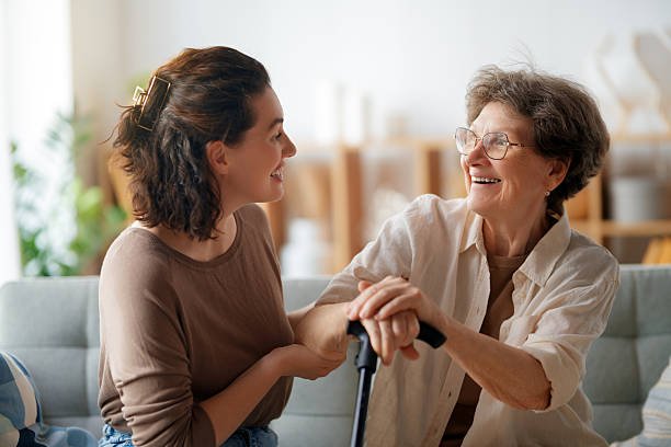 Caregiver spending time with senior